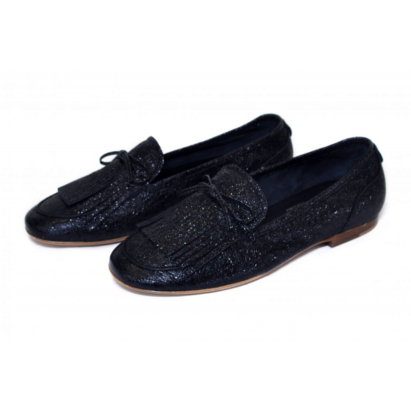 Black fringed slippers