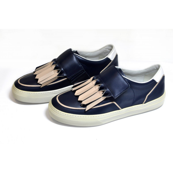 Blue Velcro slip-on sneakers with beige fringe