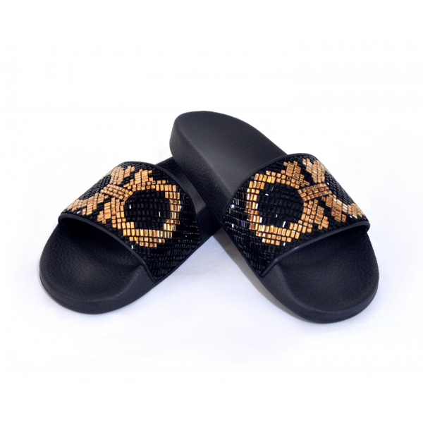 Black slides with logo and crystals