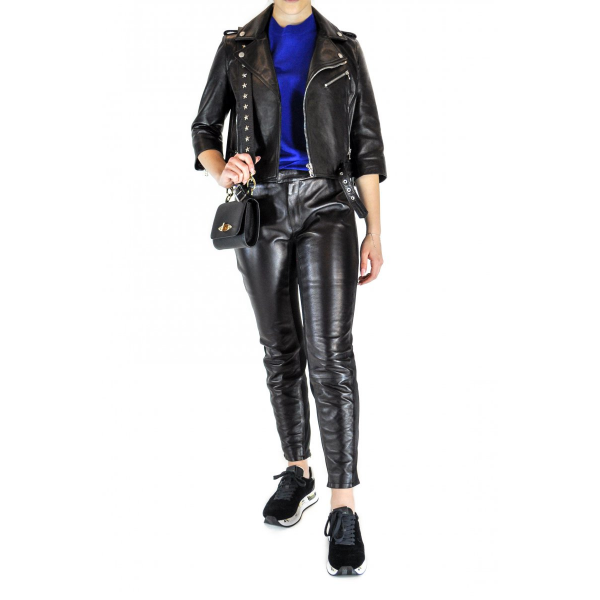 Leather trousers with elasticated inserts