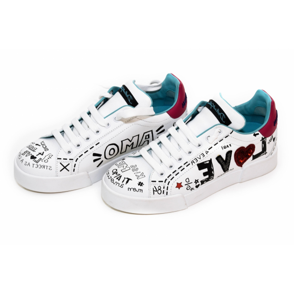 White sneakers with slogans